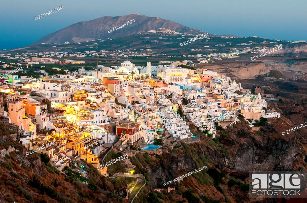 Stock Photo: Cityscape of Fira town with white houses and the caldera in Santorini, Greece. Summer holidays, Greek Islands.